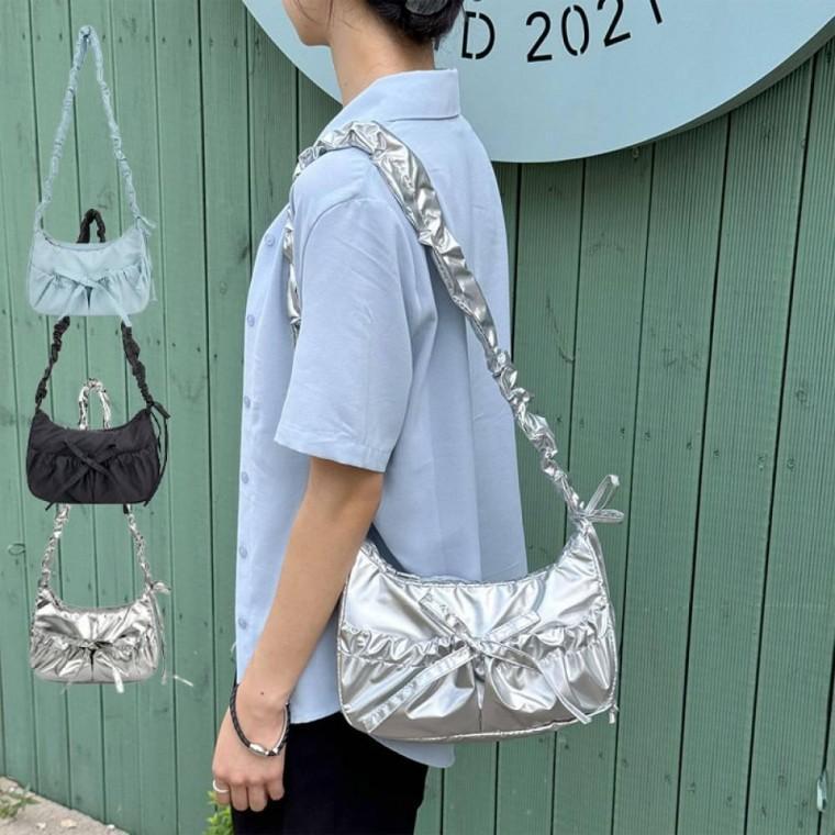 가볍고 간편한 앞 포켓 리본 포인트 넉넉한 수납 데일리 패션가방