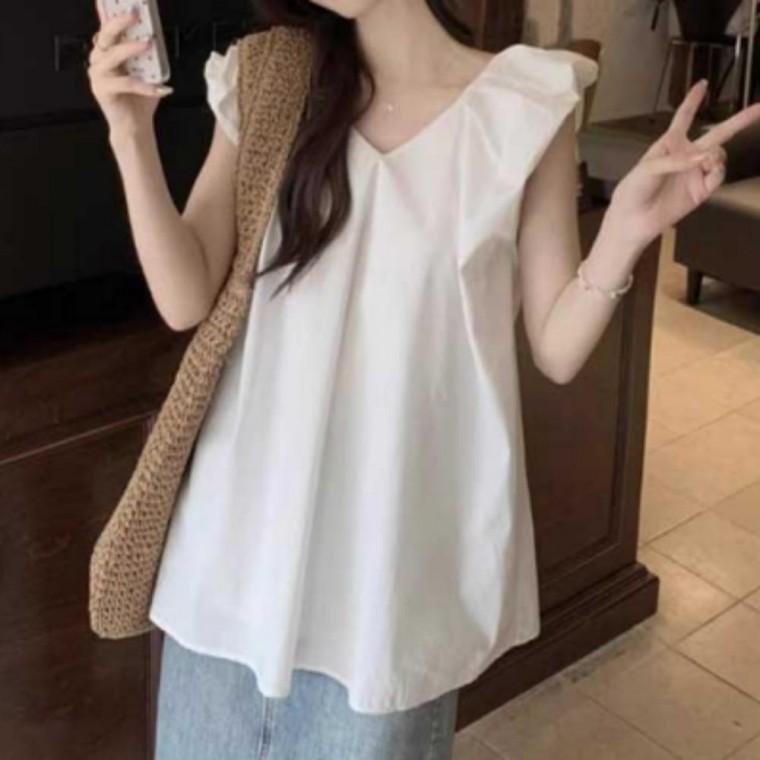 여성의류 휴양지룩 화이트블라우스 상의 민소매 민소매나시 여름 여름블라우스 화이트 브이넥 여성 프릴 코