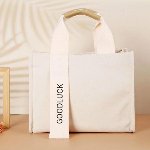 토드백 에코 캔버스 미니 크로스 가방 아이보리