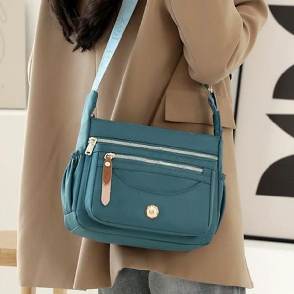 수납력 강화된 실용 디자인 데일리 크로스백 5FW